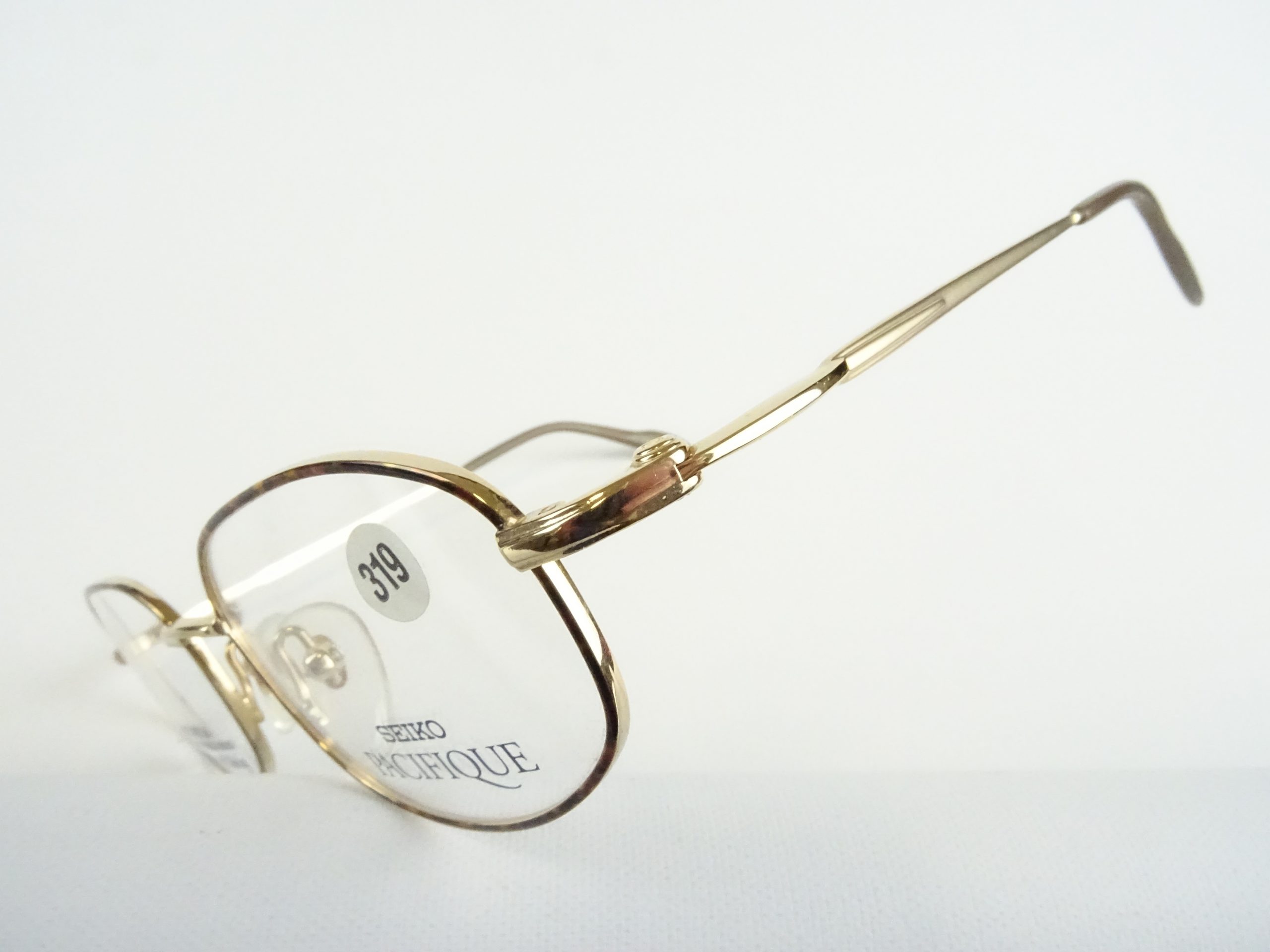 Klassische Titanbrille leicht und nickelfrei Marke SEIKO braun-goldfarbene  Herrenbrille Titanfassungen Brille Gr. M – Vintage Brillen Welt